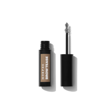 {Praline} Morphe Brow Tease Fiber-Infused Volumizing Mousse open black tube labeled MORPHE BROW TEASE with spoolie wand shown alongside cap. | Brow Tease Fiber-Infused Volumizing Mousse