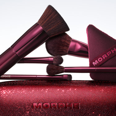 Morphe makeup brushes and case on a light gray background