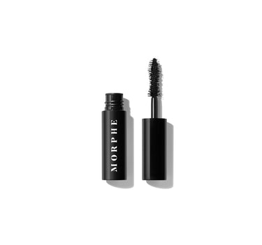 Morphe Make It Big Mini Volumizing Mascara open: black tube labeled MORPHE and used wand with dense black-product-coated bristles. | Make It Big Mini Volumizing Mascara