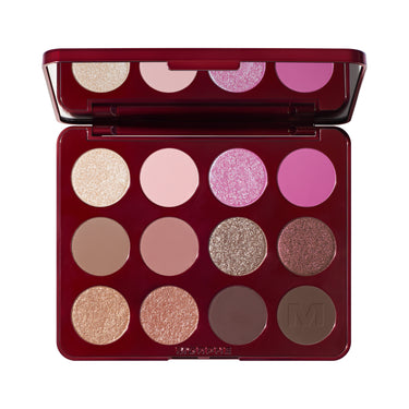 Makeup palette with various shades of eyeshadow on a white background