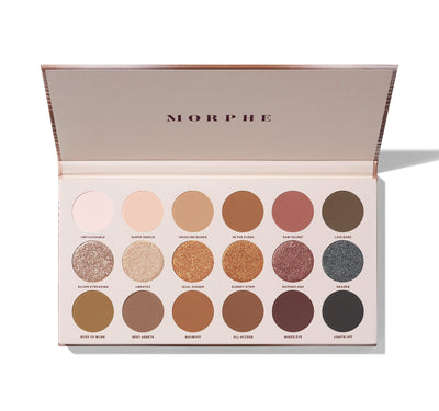 Image of the Nude Ambition 18-Pan Eyeshadow Palette, displaying a versatile range of warm neutral shades for creating stunning eye makeup looks.